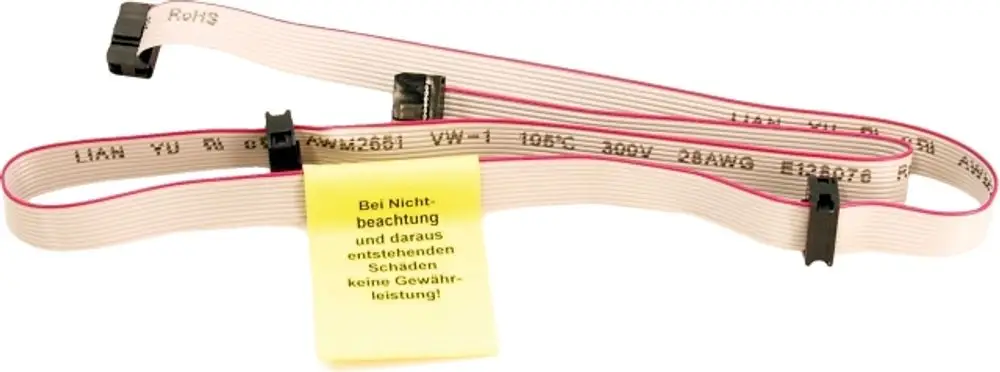 Schmale, flexible Verbindungskabel in grauer Farbe, mit pinkem Streifen und schwarzem Clip, beschriftet mit technischen Informationen, von der Marke Wolf, auf gelbem Hinweis.